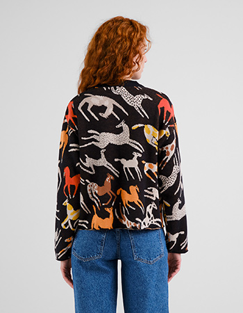 Eye-catcher trui van Dedicated met kleurrijke paarden in jacquard breisel.