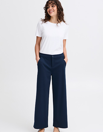 donkerblauwe pantalon tot op de enkel