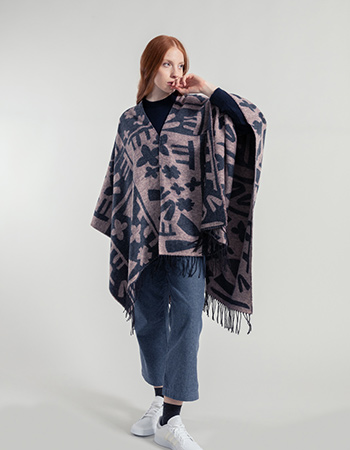 De Rifò Creek cape is een duurzame en stijlvolle cape van gerecycled katoen, eer