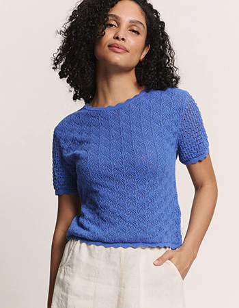 Ajour trui met korte mouw van biologisch katoen met open breipatroon.