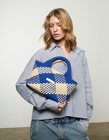 VERB TO DO tas van neopreen met tijdloze uitstraling