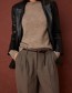 beige wollen trui