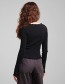 edicated rib top zwart, fair geproduceerd en GOTS-gecertificeerd.
